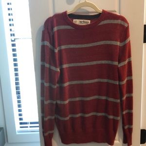 Red sweater with grey stripes